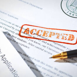 istockphoto-1125504678-612x612 +++NOTE TO INSPECTOR +++ The letterhead and logo is a generic prop designed by me.
Desktop still life of an accepted university application with an acceptance letter and rubber stamp of ACCEPTED.